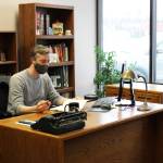Kenai Peninsula Education Association President Nathan Erfurth works in his office on Thursday, Oct. 28, 2021 in Soldotna, Alaska. (Ashlyn OHara/Peninsula Clarion)