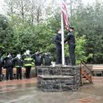A few hundred people gathered in Riverside Rotary Park on Sept. 11 to honor the 20th anniversary of the 9/11 terrorist attacks. Volunteers added new features to the memorial in preparation for the anniversary. (Dana Zigmund / Juneau Empire File)