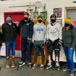Courtesy Photo
Ike Puustinen (center, in hockey gear) was awarded the JDIA hockey club award named for Matthew Campbell. He is joined by (from left to right) Judy Campbell, her husband Andrew, coach Mike Bovitz, Brandon Campbell, his mom Shawna Puustinen and his dad Kevin Puustinen.