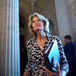 Sen. Lisa Murkowski, R-Alaska, walks to the chamber at the Capitol in Washington, Thursday, Aug. 5, 2021. Murkowski, who voted to convict Donald Trump in his second impeachment trial and has repeatedly bumped heads with the former president, announced Friday, Nov. 12, that she will run for reelection. (AP Photo/J. Scott Applewhite)