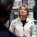 U.S. Sen. Lisa Murkowski, an Alaska Republican, speaks to reporters after filing for re-election Friday, Nov. 12, 2021, at the Division of Elections office in Anchorage, Alaska, setting up a race against a primary challenger endorsed by former President Donald Trump. (AP Photo/Mark Thiessen)