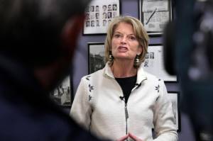 U.S. Sen. Lisa Murkowski, an Alaska Republican, speaks to reporters after filing for re-election Friday, Nov. 12, 2021, at the Division of Elections office in Anchorage, Alaska, setting up a race against a primary challenger endorsed by former President Donald Trump. (AP Photo/Mark Thiessen)