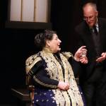 Edgar (Pat Minik) serves a beverage to Sybil Birling (Becky Orford) during dress rehearsal for An Inspector Calls. (Ben Hohenstatt / Juneau Empire)
