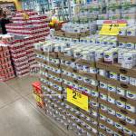 (AP Photo / David Zalubowski 
Shoppers wend their ways amid displays of cranberry sauce, green beans and soups set up for Thanksgiving Day feasts in a grocery store Tuesday in southeast Denver.