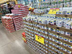 (AP Photo / David Zalubowski 
Shoppers wend their ways amid displays of cranberry sauce, green beans and soups set up for Thanksgiving Day feasts in a grocery store Tuesday in southeast Denver.