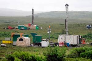 In this July 13, 2007, file photo, workers with the Pebble Mine project test drill in the Bristol Bay region of Alaska, near the village of Iliamma. The U.S. Environmental Protection Agency announced Thursday, Sept. 9, 2021, it would seek to restart a process that could restrict mining in Alaska's Bristol Bay region, which is renowned for its salmon runs. The announcement is the latest in a long-running dispute over a proposed copper-and-gold mine in the southwest Alaska region. (AP Photo/Al Grillo, File)