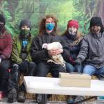 IGNITE Club members Eva Storm, Carson Carrle, Gabe Hansen, Ashlynn King and Trevor Daniels pose with Penny the turkey on Saturday. (Ben Hohenstatt / Juneau Empire)
