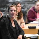 Alexandra Pierce, a planning manager at the City and Borough of Juneau, gives a presentation to the Visitor Industry Task Force in the Assembly chambers on Tuesday, Dec. 3, 2019. Taskforce members suggested creating a Tourism Manager role. On Monday, city officials named Pierce to fill the newly created role. (Michael Penn /Juneau Empire File)