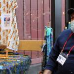 Jon Lyman sells bespoke fishing polls at Juneau Public Market on Friday, Nov. 26, 2021. (Dana Zigmund / Juneau Empire)