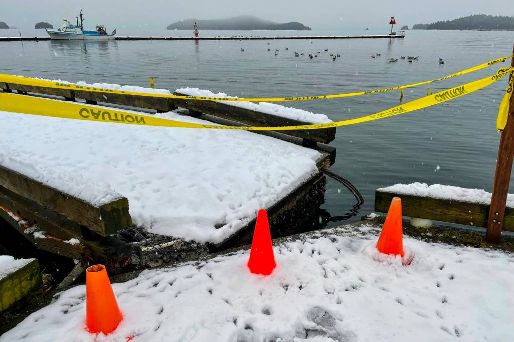 High winds in the early morning of Nov. 26, 2021 damaged two sections of float in Don D. Statter Harbor, snapping a tension line visible on the right corner of the damaged section. (Michael S. Lockett / Juneau Empire)