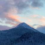 Finally, a sunset seen over Douglas Island after days of whiteout conditions on Dec. 1, 2021. (Courtesy Photo / Denise Carroll)