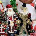 Dana Zigmund/Juneau Empire 
A collection of Santas begin to take shape on a table at the Mendenhall Mall on Nov. 24. Organizers were busy setting up the Juneau Holiday Village in advance of its Black Friday debut. This is the first year the annual fundraiser will be held at the Mendenhall Mall.