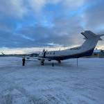 An Alaska Seaplanes Pilatus PC-12 sits on the tarmac at Yakutat Airport on Dec. 5, 2021, a charter flight to help stranded travelers leave after an airport instrument failure prevented any commercial flights from reaching the small city. The National Weather Service is currently working on fixing the problem. (Courtesy photo / Norton Gregory)