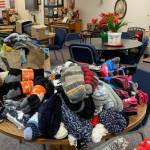 Last year's haul of donated socks to the Mountain View Senior and Disable Housing is laid out on a table in this undated courtesy photo from Briana Heller, the home's services coordinator. Heller said the home is running a donation drive for socks and slippers as Christmas gifts for the home's 67 residents. (Courtesy photo / Briana Heller)