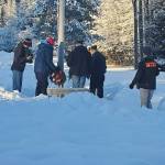 Members of the American Legion Post 25 prepare to lay wreaths Alaska Memorial Park on Dec. 18, 2021 in concert with Wreaths Across America ceremonies nationwide. The group also laid wreaths at the Shrine of St. Therese and Evergreen Cemetery that day. (Courtesy photo / American Legion Post 25)