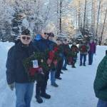 Members of the American Legion Post 25 prepare to lay wreaths at Alaska Memorial Park on Dec. 18, 2021. The group also laid wreaths at the Shrine of St. Therese and Evergreen Cemetery that day. (Courtesy photo / American Legion Post 25)