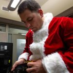 U.S. Marine Corps Staff Sgt. Federico Gomez, the motor transportation chief with Delta Company, 4th Law Enforcement Battalion, Marine Forces Reserve, dresses as Santa Claus before handing gifts to the students of Shungnak School in Shungnak, Alaska, Dec. 8, 2021. (U.S. Marine Corps / Cpl. Brendan Mullin)