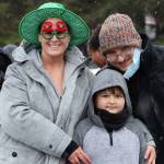 Caren Yerkes, Maggie Yerkes, Russell Hill and Myles Yerkes pose together ahead of Maggie Yerkes costumed Polar Dip. (Ben Hohenstatt / Juneau Empire)