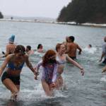 Participants rush back to shore following the 2022 Polar Dip on Saturday. After a pandemic-induced break last year, the long-running event returned to Auke Recreation Area. (Ben Hohenstatt / Juneau Empire)
Participants rush back to shore following the 2022 Polar Dip on Saturday. After a pandemic-induced break last year, the long-running event returned to Auke Recreation Area. (Ben Hohenstatt / Juneau Empire)