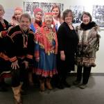 Sámi Reindeer People exhibit opening in Vesterheim Norwegian American Museum, Decorah, Iowa. L to R: Marlene Wisuri, Cari Mayo, Nathan Muus, Faith Fjeld, Lois Stover (Sara, Twitchell, Kvamme original Sámi herder families), Marie Olson, Nancy Olson, Pearl Johnson. (Courtesy Photo / Nathan Muus)