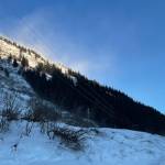 Snow blows off Mount Roberts high above the Thane avalanche chute, where an avalanche blew across the road during a major snowstorm last weekend. (Michael S. Lockett / Juneau Empire)