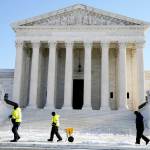 The Supreme Court shown Friday, Jan. 7, 2022, in Washington. The Supreme Court is taking up two major Biden administration efforts to bump up the nations vaccination rate against COVID-19 at a time of spiking coronavirus cases because of the omicron variant. (AP Photo/Evan Vucci)