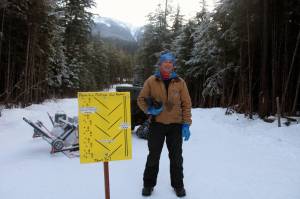 Wayne Carnes prepares to begin his volunteer grooming run at Pioneer Road on Jan. 18. Carnes is a volunteer with the Juneau Nordic Ski Club. (Dana Zigmund/Juneau Empire)