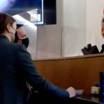 Screenshot 
District Attorney Angie Kemp and public defender Eric Hedland consult with Superior Court Judge Amy Mead on Jan. 20, 2022 during a trial of a man accused of killing another man in Yakutat in 2018.