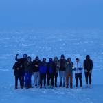 The Thunder Mountain High School boys basketball team stand on the Arctic Ocean. (Courtesy Photo)