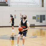 Sean Oliver, who led the Juneau-Douglas High School: Yadaa.at Kalé Crimson Bears in scoring at the Alaska Airlines Classic, prepares to shoot during practice on Dec. 15, 2021. (Michael S. Lockett / Juneau Empire File)