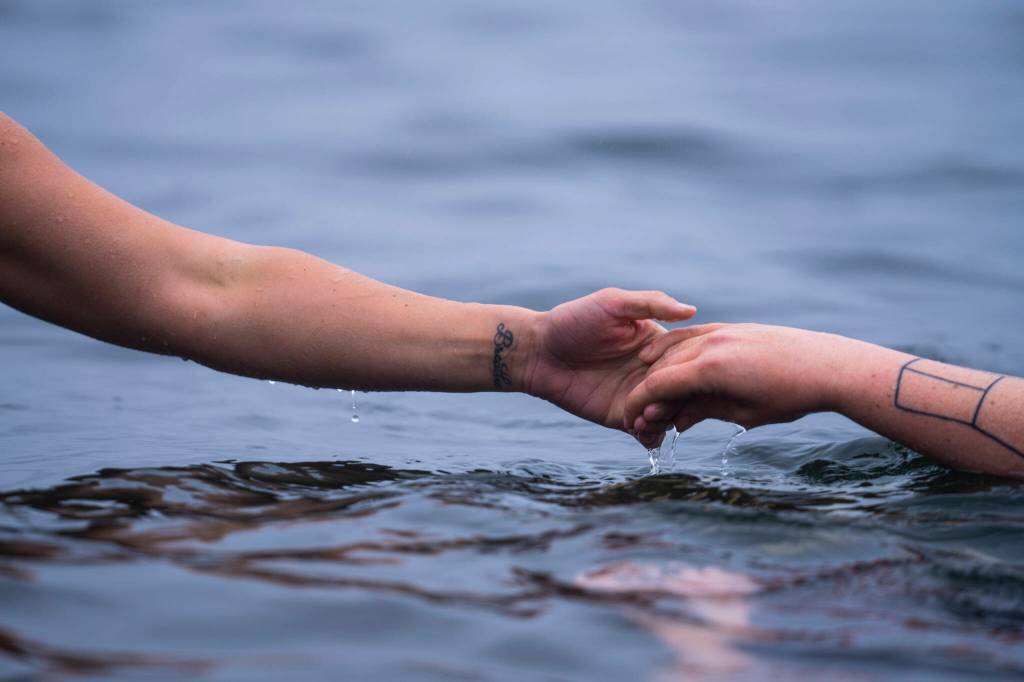 Cold ocean dipping has supported resilience and mental strength building on these shores for over ten thousand years. On Prince of Wales Island two friends take a soak. (Courtesy Photo / Bethany Goodrich)
