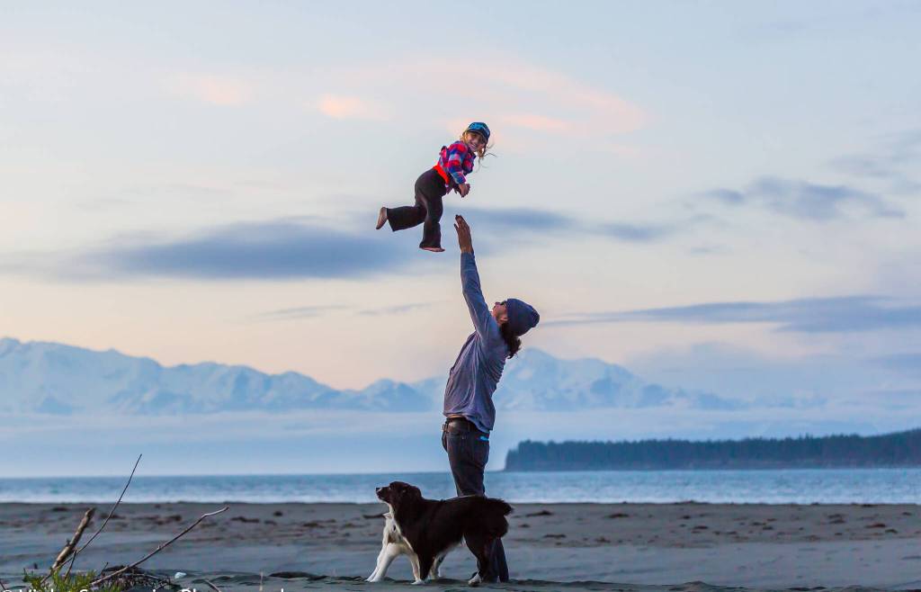 Joy and love are on full display during a sunset on one of Yakutats iconic beaches. (Courtesy Photo / Violet Sensmeir)