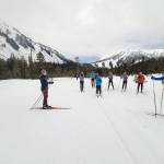 Maddie Phaneuf, a Team USA biathlete, coaches up Juneau Nordic Ski Team members during a recent stop in the capital city. Phaneuf said it was only her second time in Alaska. Despite heavy rain, local athletes were able to learn from the Olympic-caliber athlete. (Courtesy Photo / Mike Justa)