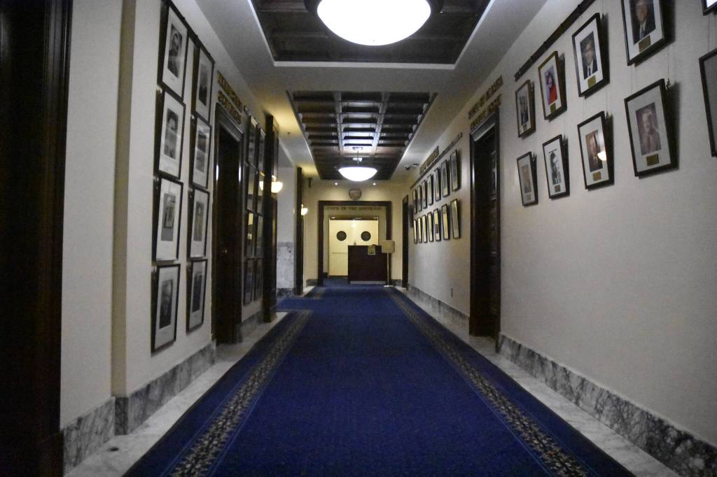 The offices of the governor and lieutenant governor are on the third floor of the Alaska State Capitol, the governor's office can be seen here on Feb. 1, 2022. The corridor walls are lined with photos of all Alaska's previous governor's and lieutenant governors going back to territorial days. (Peter Segall / Juneau Empire)