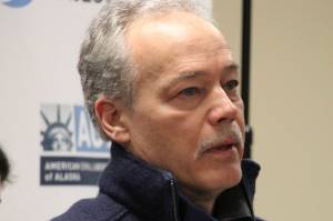 Former Alaska Psychiatric Institute staff psychiatrist Dr. John Bellville speaks during a news conference on Jan. 10, 2019, in Anchorage, Alaska. The state of Alaska has settled a lawsuit with Bellville, who was one of three former state employees who claimed they were wrongfully fired when Alaska Gov. Mike Dunleavy took office. Under the agreement, announced Wednesday Feb. 2, 2022, Bellville will receive $275,000, reflecting lost wages, damages and attorney's fees. (AP Photo / Mark Thiessen, File)