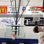Wallace Adams goes up for a layup during practice at Thunder Mountain High School. (Ben Hohenstatt / Juneau Empire File)