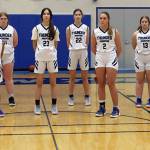 The Thunder Mountain High School girls basketball team poses for a photo ahead of mid-December practice. (Ben Hohenstatt / Juneau Empire File)