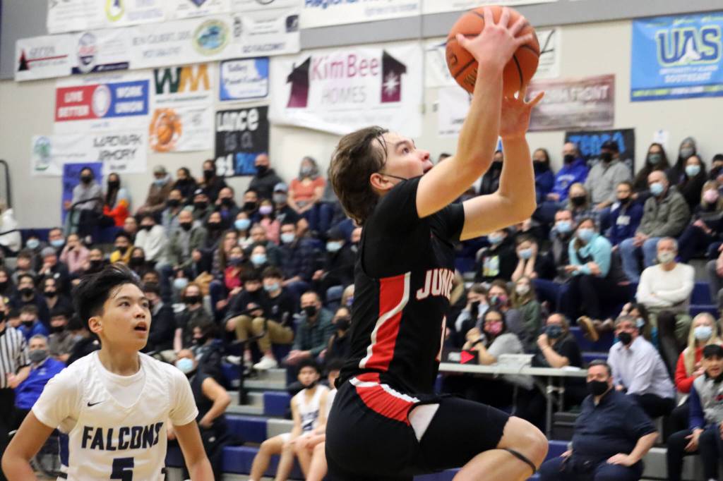 Porter Nelson rises up for a layup attempt against during a win against Thunder Mountain High School. (Ben Hohenstatt / Juneau Empire)