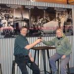 Dana Zigmund / Juneau Empire
Geoff and Marcy Larson toast to 35 years of brewing in the Alaskan Brewing Co. Tap Room on Feb. 4. A timeline of business milestones hangs behind them.