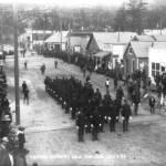 African-American soldiers of Company L, 24th Infantry, famously known as Buffalo Soldiers on parade on 5th Avenue in Skagway, between Broadway and State streets, in front of the Daily Budget newspaper on July 4, 1899. A recent book from a University of Alaska Anchorage history professor traces the long history of Black Americans in Alaska. (Courtesy image / Alaskas Digital Archives)