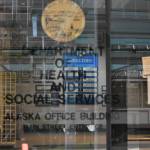 The entrance to the Alaska Department of Health and Social Services building in downtown Juneau on Jan. 14, 2021. Gov. Mike Dunleavy has twice proposed splitting the department using an executive order, but the Division of Legislative Legal Services has raised issues with the most recent order. (Peter Segall / Juneau Empire file)