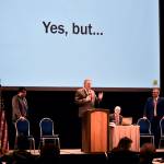 Gov. Mike Dunleavy speaks to the Alaska Municipal League and Alaska Conference of Mayors winter meeting at Centennial Hall on Thursday, Feb. 17, 2022. The governor gave a presentation on the state finances which included a slide referencing the disagreements with his proposals some lawmakers were likely to have. (Peter Segall / Juneau Empire)