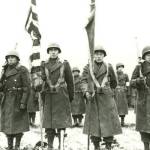 Courtesy photo / United States Army Signal Corps 
The Color Guard of the 442nd RCT stands at attention while citations are read following the fierce fighting in the Vosges area of France on November 12, 1944.