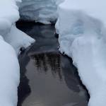 This photo taken on a recent weekend shows layers of snow along a creek at Eaglecrest. (Courtesy Photo / Deborah Rudis)