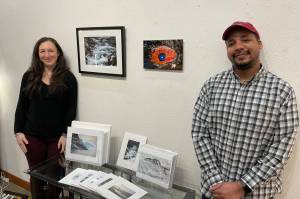 Michael S. Lockett / Capital City Weekly
Sarah Davidson and Kevin Jeffrey, Annie Kaills featured artists for the March 2022 First Friday, stand by a display of their work at the store on Wednesday.