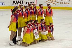Team Forget-Me-Not poses with the 2nd place trophy for the Ice Sports Industry 2022 Winter Classic in San Jose, California. (Courtesy photo / Juneau Skating Club)