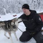 Five-time Iditarod champion Dallas Seavey is shown Feb. 22, 2022, playing with Prophet, one of his lead dogs, at his kennel in Talkeetna, Alaska. Seavey is tied with musher Rick Swenson for the most Iditarod victories ever, and Seavey is looking for his sixth title when the Iditarod Trail Sled Dog Race starts this weekend in Alaska. (AP Photo / Mark Thiessen)