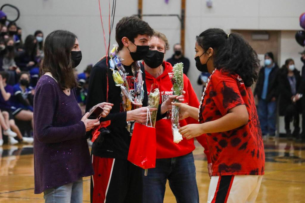 Michael S. Lockett / Juneau Empire
Friends and family recognize Tias Carney during Senior Night at Juneau-Douglas High School: Yadaa.at Kalé on Saturday.