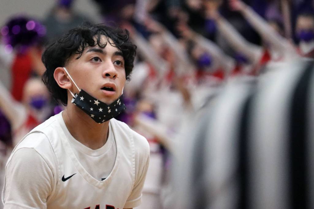 Ben Hohenstatt / Juneau Empire
JDHS Alwen Carrillo eyes the basket ahead of a free throw on Friday night. Carrillos 13 points, including 11 in the first quarter, paced the Crimson Bears.