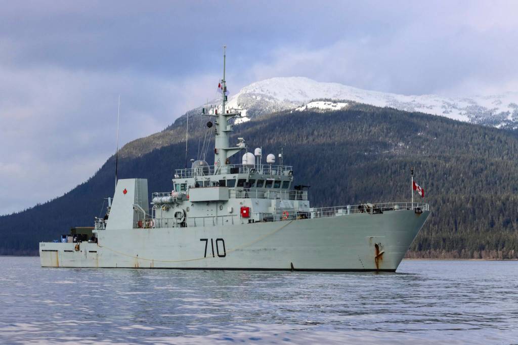 Her Majestys Canadian Ship Brandon lies at anchor in the Stephens Passage as divers investigate a simulated naval mine on March 6, 2022, as part of exercise Arctic Edge 2022. (Michael S. Lockett / Juneau Empire)